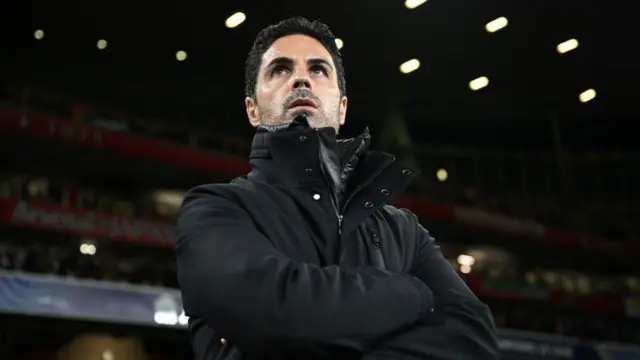 Mikel Arteta looks on