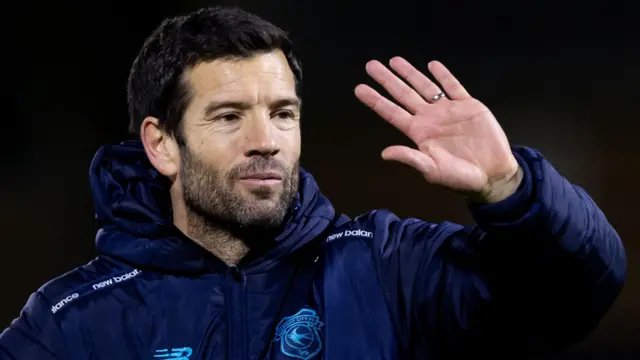 Brian Barry-Murphy waves to Cardiff fans