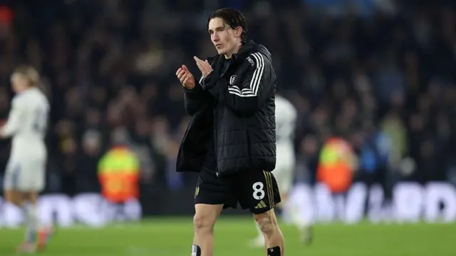 Harry Wilson of Fulham applauds the fans during the Premier League match between Leeds United and Fulham at Elland Road on January 17.