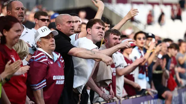 West Ham United's fans react towards their players 