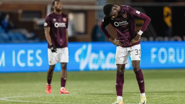 Hearts' Musa Drammeh (R) looks dejected during a William Hill Premiership match between Kilmanock and Heart of Midlothian at Rugby Park, 