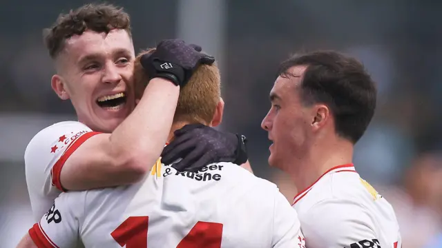 Eoin McElholm, Peter Harte and Darragh Canavan