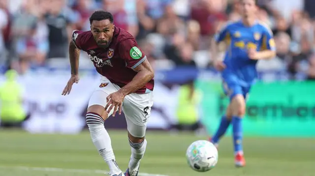 Callum Wilson runs after a ball while playing for West Ham