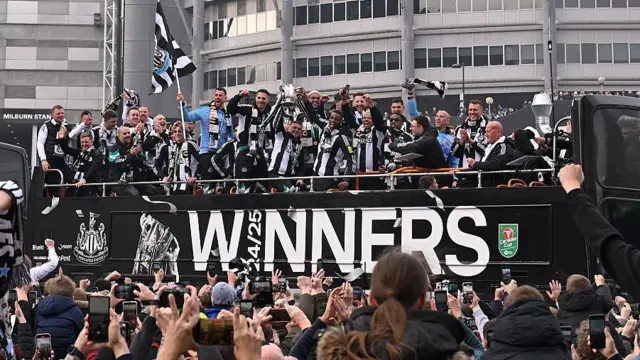 Newcastle players celebrate Carabao Cup win on open-top bus parade