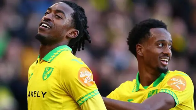 Norwich City player Paris Maghoma celebrates his goal against West Bromwich Albion, congrtaulated by teammate Ali Ahmed.