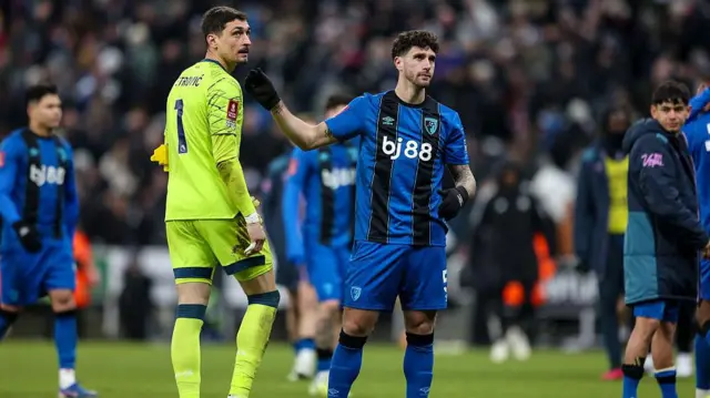 Petrović and Marcos Senesi of Bournemouth