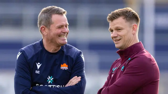 Sean Everitt shares a laugh with Scarlets coach Dwayne Peel pre-game