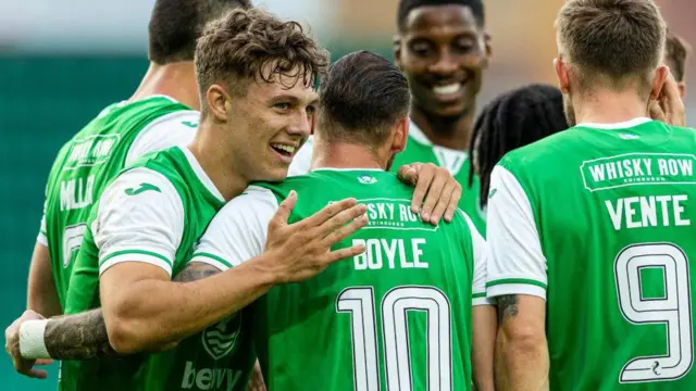 Hibernian's Martin Boyle celebrates with Rudi Molotnikov as he scores to make it 2-0 during a Premier Sports Cup match between Hibernian and Queen's Park