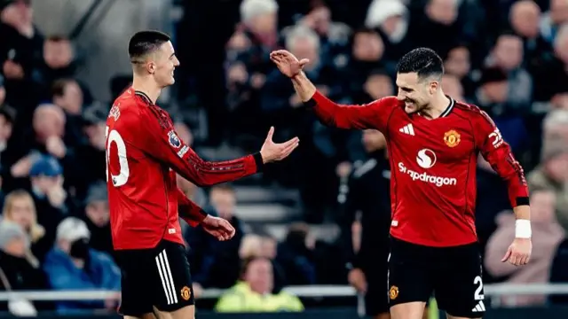 Manchester United pair Diogo Dalot (right) and Benjamin Sesko 