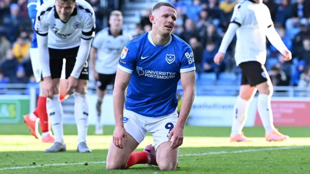 Colby Bishop looking dejected on his knees