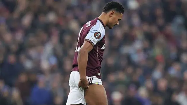 Ollie Watkins holds his hamstring