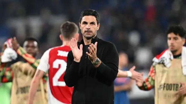 Mikel Arteta applauds after match