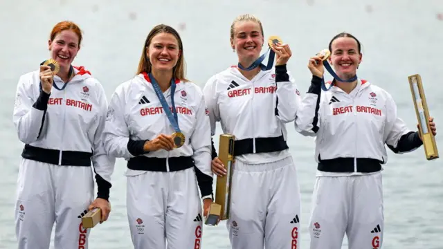 Hannah Scott (second from right) becomes an Olympic champion