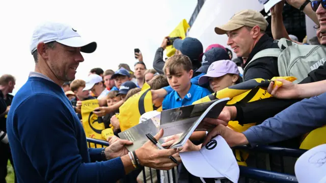 Rory Mcilroy signs autographs for fans