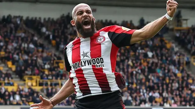 Bryan Mbeumo celebrates after scoring for Brentford against Wolves in the Premier League