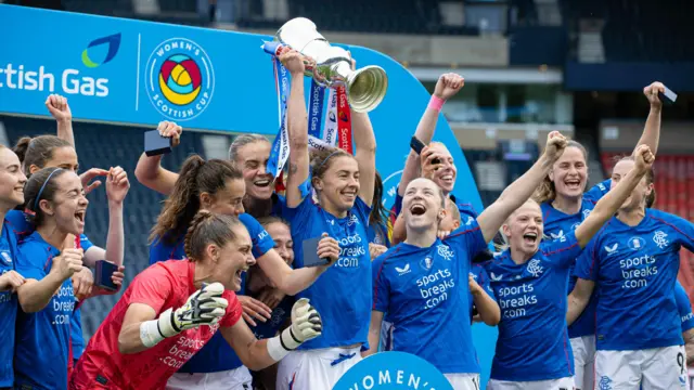 Rangers captain Nicola Docherty lifts the trophy