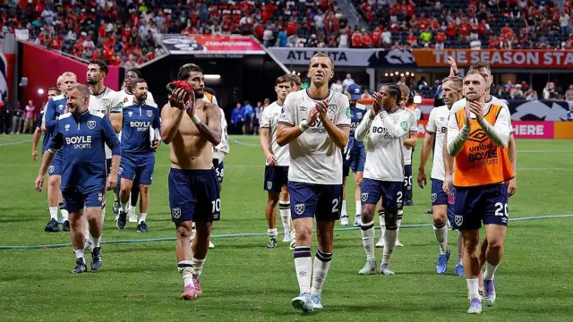 West Ham players clap fans
