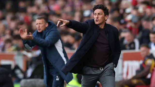 Brentford manager Keith Andrews gives instructions from the sideline
