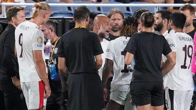Pep Guardiola and Man City players