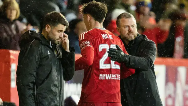 Aberdeen Manager Jimmy Thelin (R) with Jack Milne as he is substituted off during a William Hill Premiership match between Aberdeen and St Johnstone at Pittodrie, on December 07, 2024, in Aberdeen