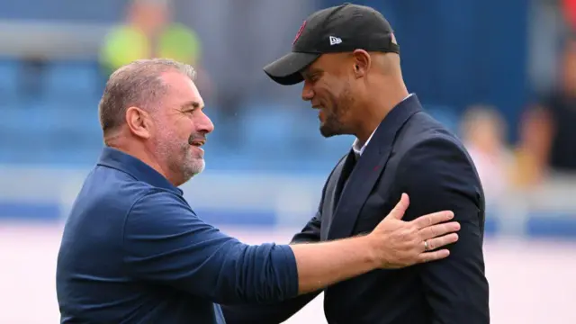 Vincent Kompany greets Ange Postecoglou