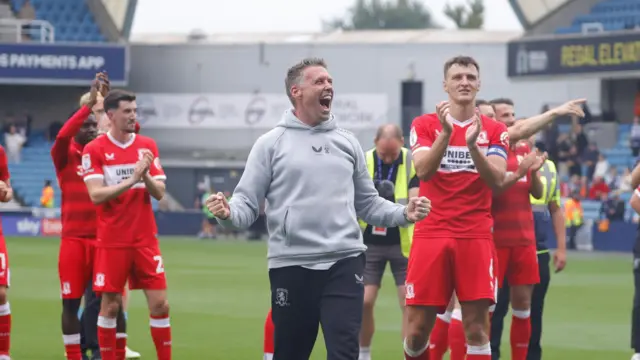 Middlesbrough boss Rob Edwards roars with delight after the side's victory over Millwall