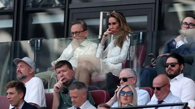 David Sullivan sits with his fiancé at London Stadium