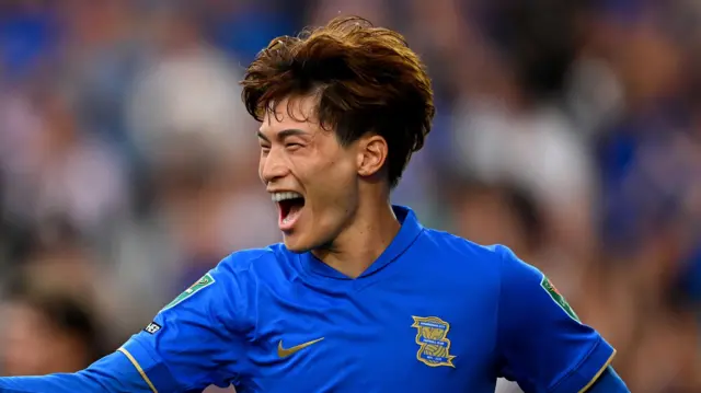 Kyogo Furuhashi in a blue Birmingham City home jersey during a match