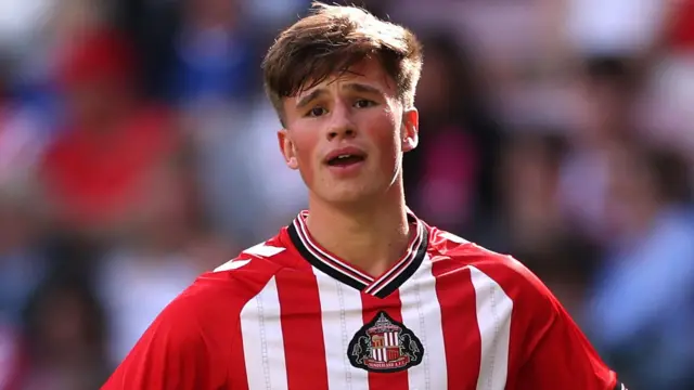 Tommy Lavery, wearing Sunderland's red and white striped home shirt, during a pre-season friendly against Rayo Vallecano in August 2025