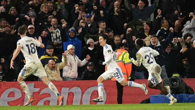 Ao Tanaka celebrates after scoring Leeds United's late goal