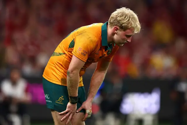 Tom Lynagh of the Wallabies looks on