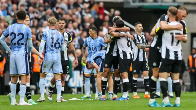 Newcastle United players celebrate after the Premier League match between Newcastle United and Tottenham Hotspur