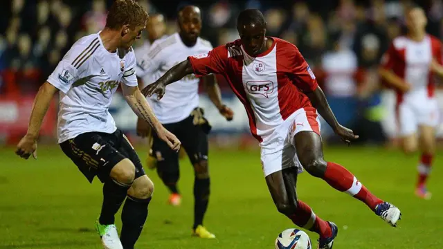 Garry Monk in action for Swansea against Crawley in 2012