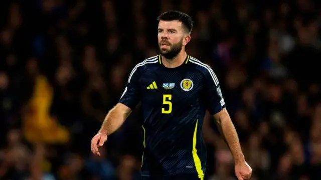Grant Hanley in action for Scotland
