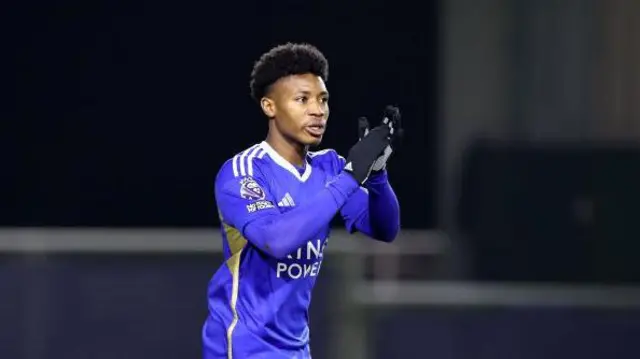 Kian Pennant, playing for Leicester Under-21s, clapping whilst wearing gloves