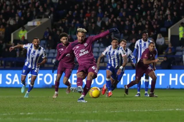 Cardiff's Callum Robinson misses a penalty