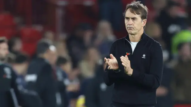 Julen Lopetegui applauds West Ham supporters after the loss at Nottingham Forest