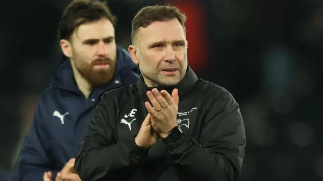 Derby boss John Eustace claps the fans after the 1-1 draw with Portsmouth