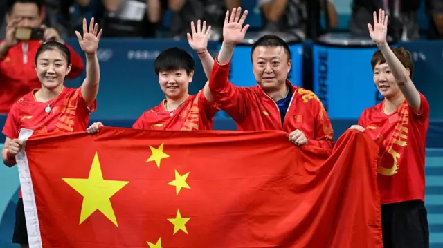 China's Chen Meng (L), Sun Yingsha (2nd L) and Wang Manyu (R)