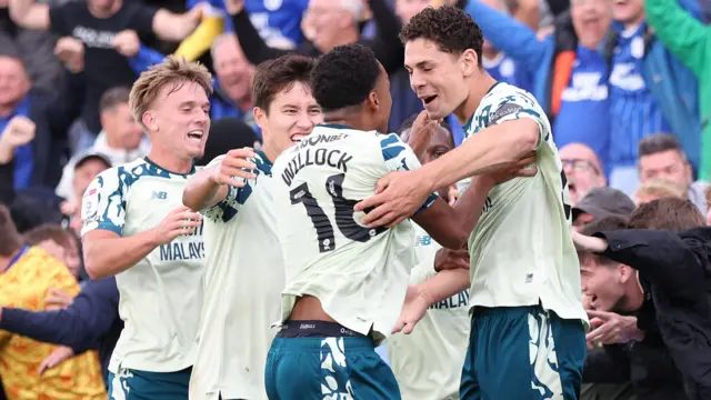 Cardiff City players including Yousef Salech celebrate a goal