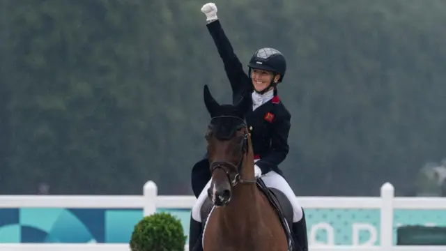 Laura Collett celebrates