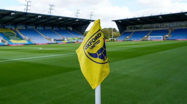 Oxford United's club badge on a corner flag at the Kassam Stadium