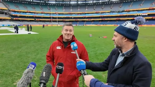 John Fogarty speaking to reporters at the MCG
