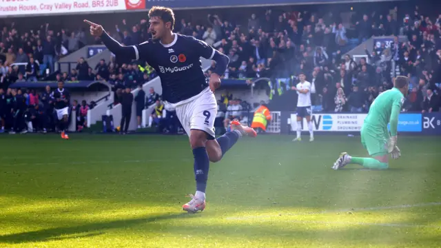 Millwall's Mihailo Ivanovic running away to celebrate his goal against Preston