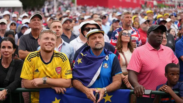 Ryder Cup supporters watch