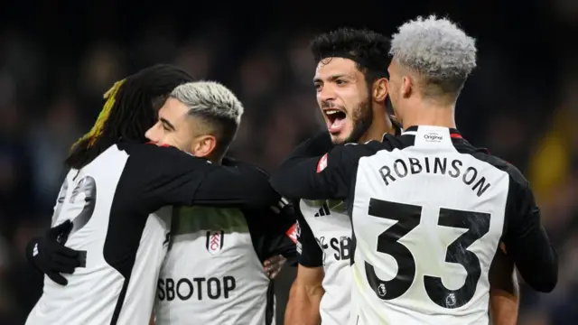 Raul Jimenez of Fulham celebrates with Antonee Robinson of Fulham after scoring his team's second goal during the Premier League match between Fulham FC and Nottingham Forest at Craven Cottage