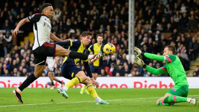 Fulham's Rodrigo Muniz (left) scores his side's second goal during the Premier League match between Fulham FC and AFC Bournemouth at Craven Cottage