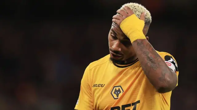 Mario Lemina reacts during Wolves' defeat to Liverpool