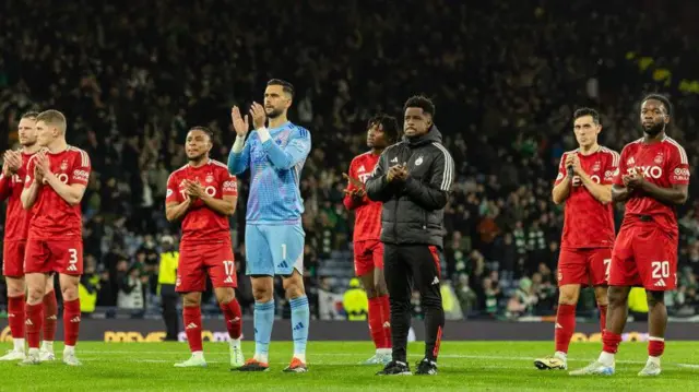 Aberdeen players after cup defeat by Celtic