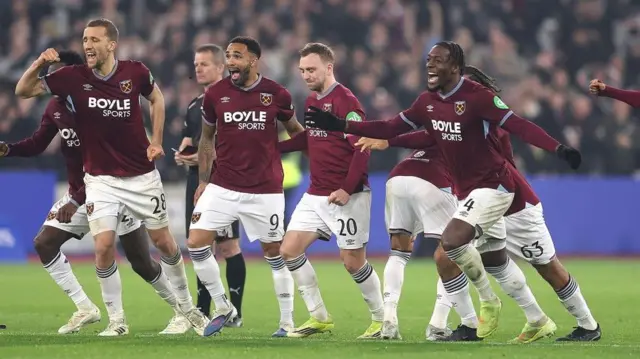 West Ham's players celebrate reaching the FA Cup quarter-finals